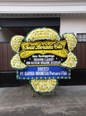 Papan Bunga Duka di Puser