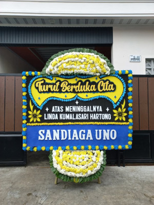 Papan Bunga Duka di Puser